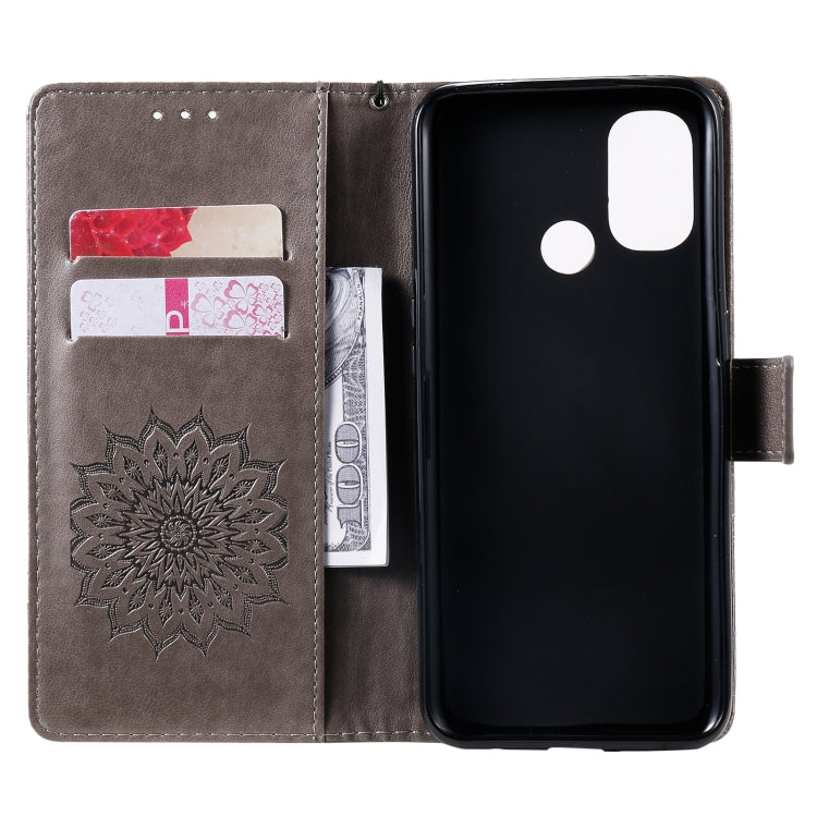 For OnePlus Nord N100 Sun Embossing Pattern Horizontal Flip Leather Case with Card Slot & Holder & Wallet & Lanyard