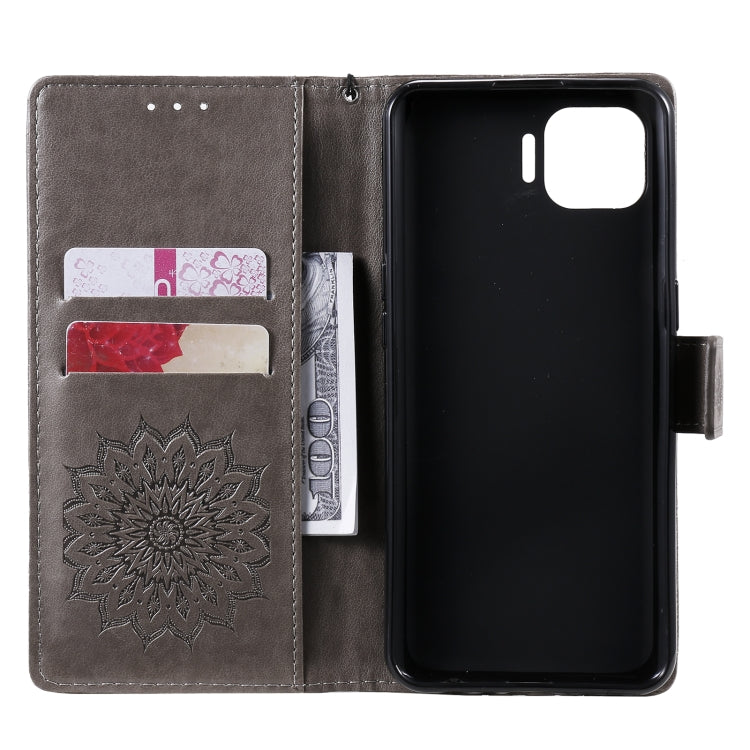 For OPPO F17 Pro / Reno4 Lite Sun Embossing Pattern Horizontal Flip Leather Case with Card Slot & Holder & Wallet & Lanyard