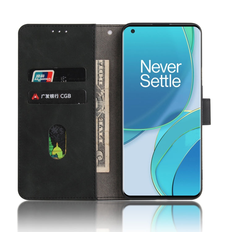 For OnePlus 9 Pro Solid Color Skin Feel Magnetic Buckle Horizontal Flip Calf Texture PU Leather Case with Holder & Card Slots & Wallet