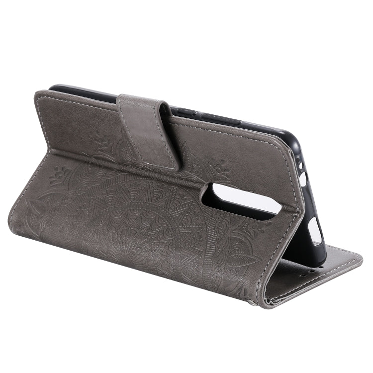 For Xiaomi Redmi K20 / K20 Pro Totem Flower Embossed Horizontal Flip TPU + PU Leather Case with Holder & Card Slots & Wallet