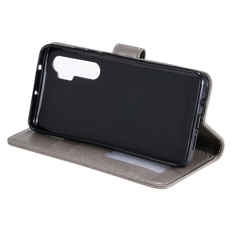 For Xiaomi Mi Note 10 Lite Totem Flower Embossed Horizontal Flip TPU + PU Leather Case with Holder & Card Slots & Wallet