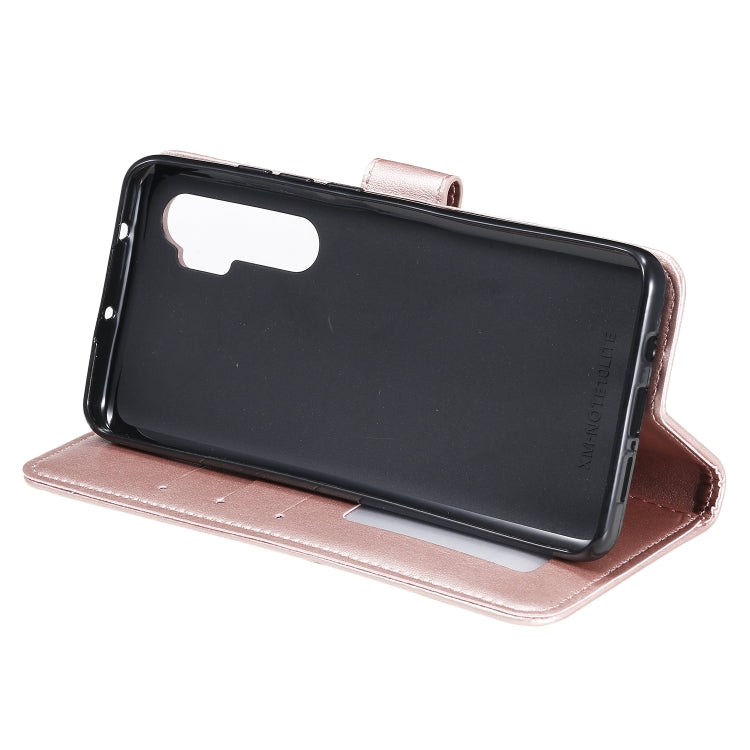 For Xiaomi Mi Note 10 Lite Totem Flower Embossed Horizontal Flip TPU + PU Leather Case with Holder & Card Slots & Wallet