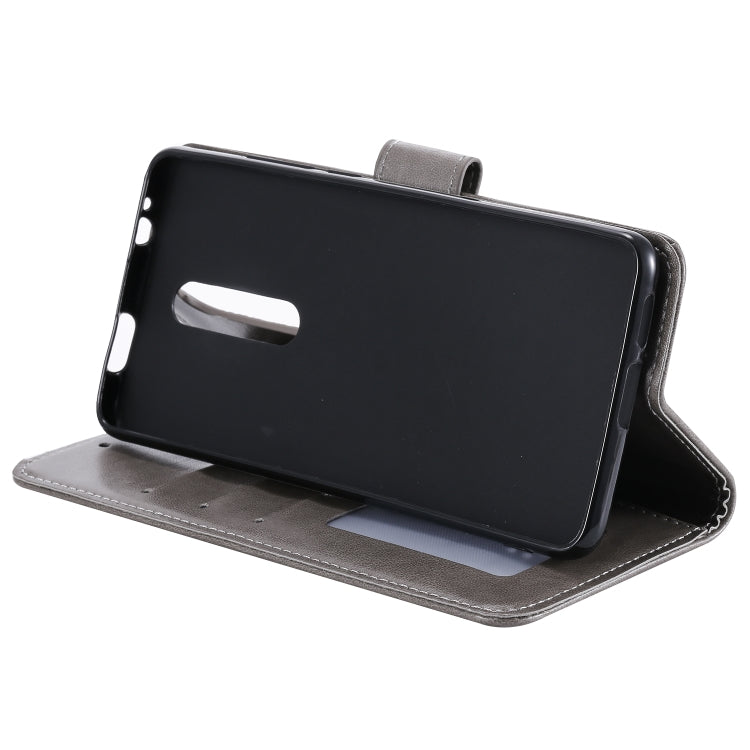 For Xiaomi Redmi 8 / 8A Totem Flower Embossed Horizontal Flip TPU + PU Leather Case with Holder & Card Slots & Wallet