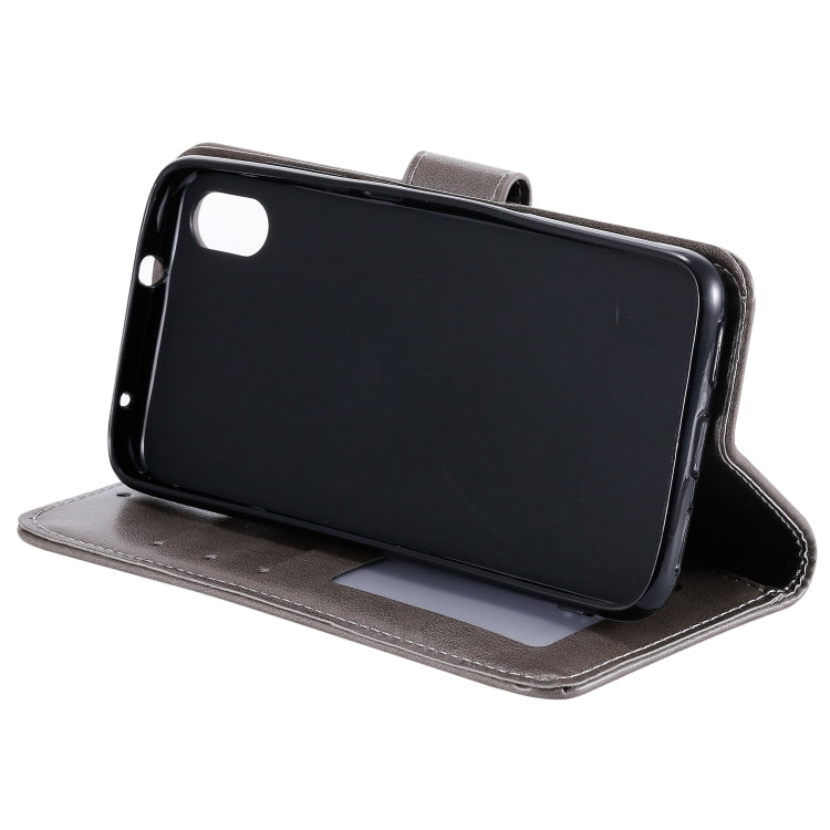 For Xiaomi Redmi 7A Totem Flower Embossed Horizontal Flip TPU + PU Leather Case with Holder & Card Slots & Wallet