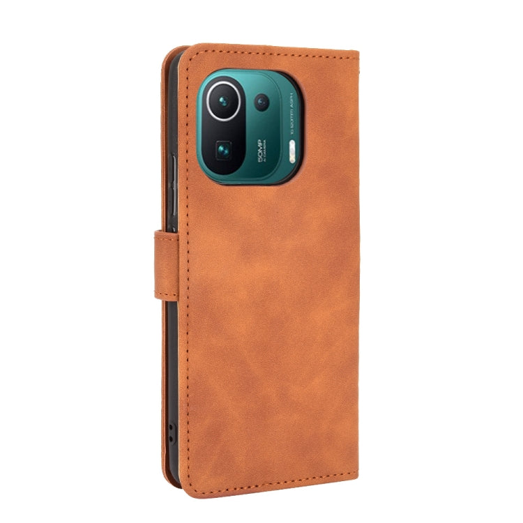 For Xiaomi Mi 11 Pro Solid Color Skin Feel Magnetic Buckle Horizontal Flip Calf Texture PU Leather Case with Holder & Card Slots & Wallet