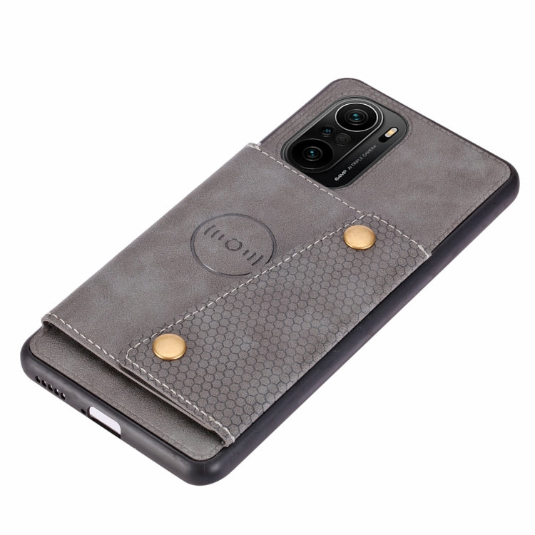 For Xiaomi Redmi K40 Double Buckle PU + TPU Shockproof Magnetic Protective Case with Card Slot & Holder