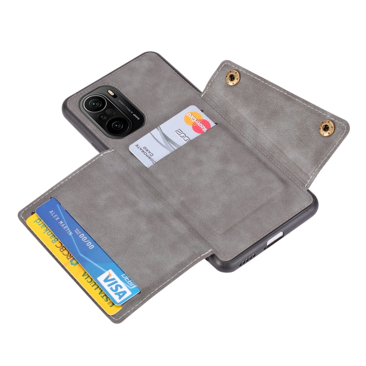 For Xiaomi Redmi K40 Double Buckle PU + TPU Shockproof Magnetic Protective Case with Card Slot & Holder