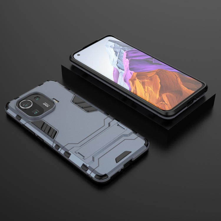 For Xiaomi Mi 11 Pro Shockproof PC + TPU Protective Case with Hidden Holder