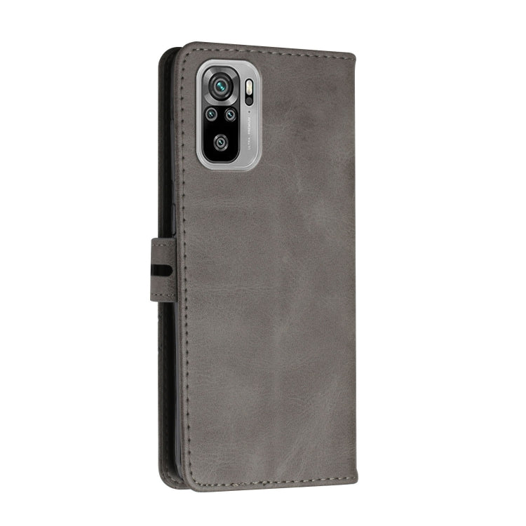For Xiaomi Redmi Note 10 Stitching Style 2-Color Cow Texture Horizontal Flip PU Leather Case with Holder & Card Slot & Lanyard