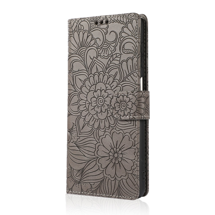 For Samsung Galaxy A12 Skin Feel Embossed Sunflower Horizontal Flip Leather Case with Holder & Card Slots & Wallet & Lanyard