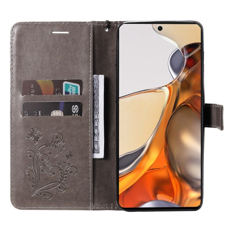 For Xiaomi Mi 11T / 11T Pro Pressed Printing Butterfly Pattern Horizontal Flip PU Leather Case with Holder & Card Slots & Wallet & Lanyard