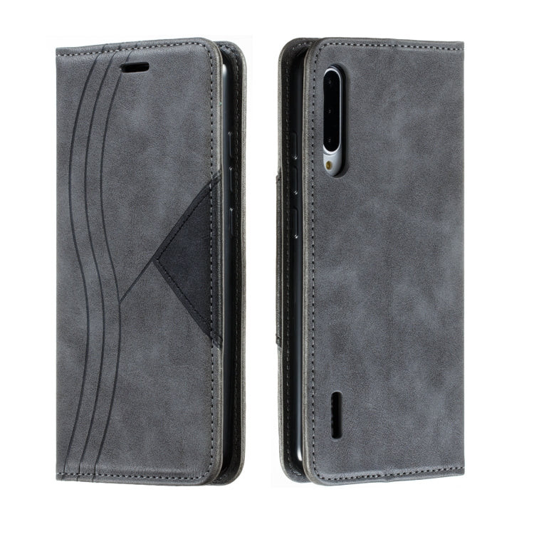 For Xiaomi Mi CC9e / Mi A3 Splicing Color Magnetic Hem Horizontal Flip Leather Case with Holder & Card Slots