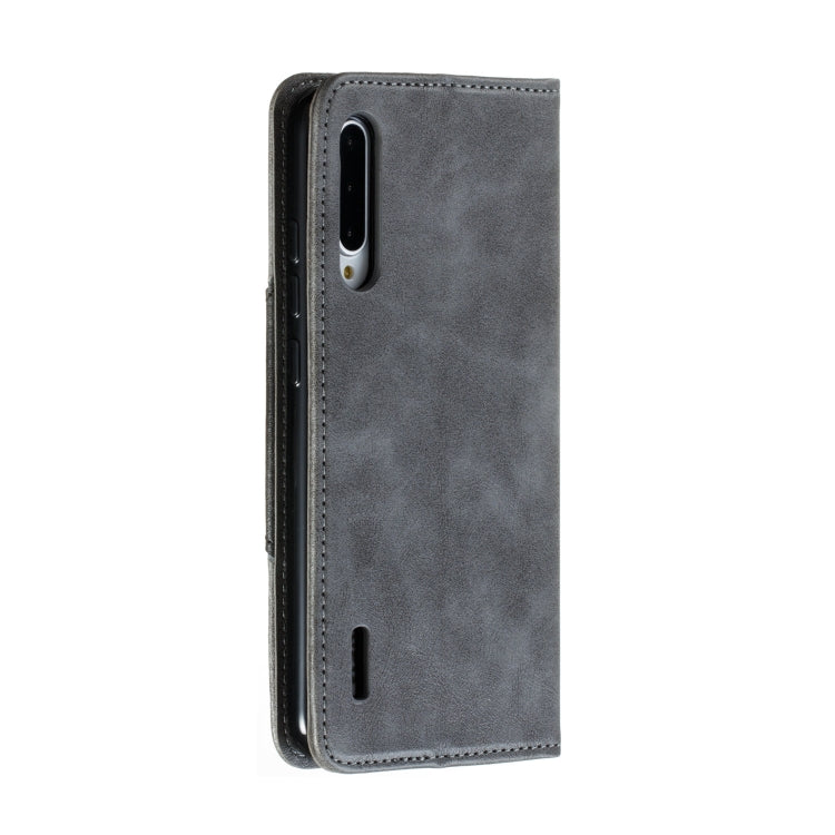 For Xiaomi Mi CC9e / Mi A3 Splicing Color Magnetic Hem Horizontal Flip Leather Case with Holder & Card Slots