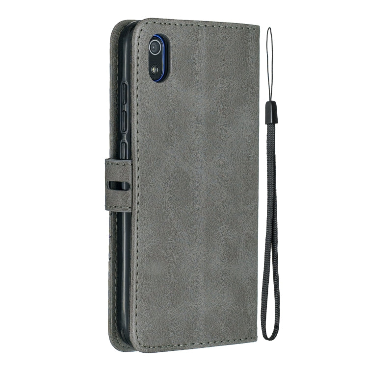 For Xiaomi Redmi 7A Stitching Style 2-Color Cow Texture Horizontal Flip PU Leather Case with Holder & Card Slot & Lanyard