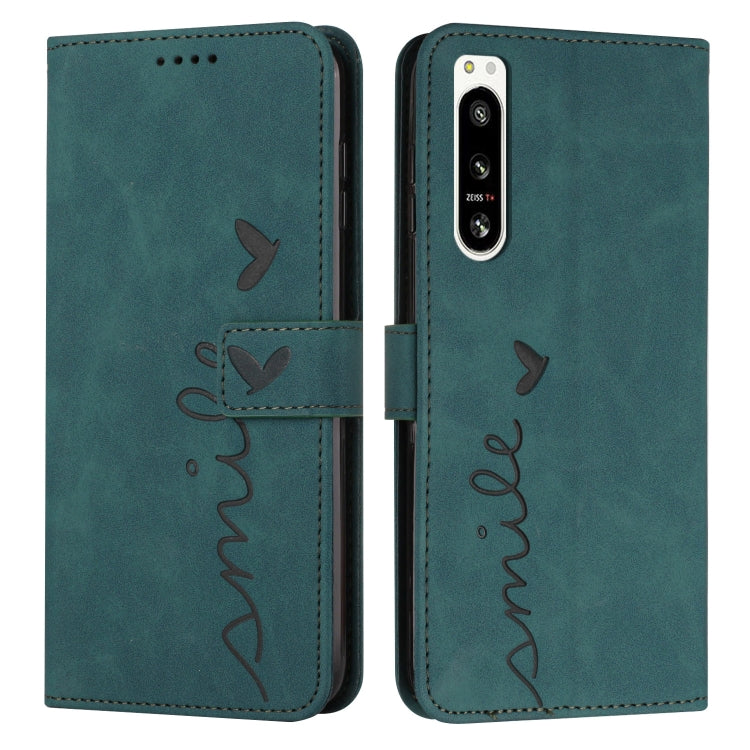 For Sony Xperia 5 IV Skin Feel Heart Embossed Leather Phone Case with Lanyard