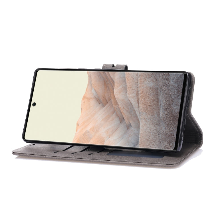 For Google Pixel 7a Embossed Happy Cat Pattern Flip Leather Phone Case