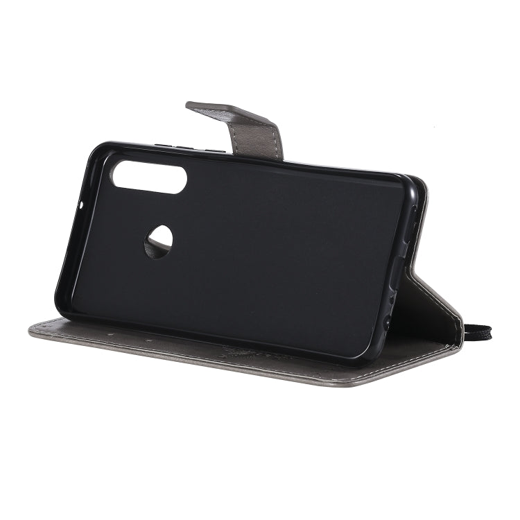 For Huawei Y6p Tree & Cat Embossed Pattern Horizontal Flip Leather Case with Holder & Card Slots & Wallet & Lanyard