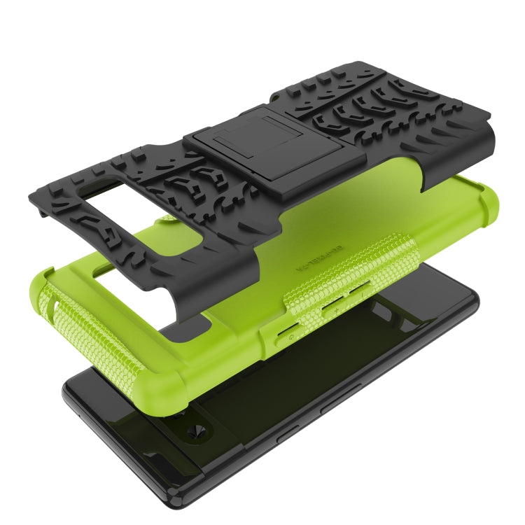 For Google Pixel 7a Tire Texture TPU + PC Phone Case with Holder