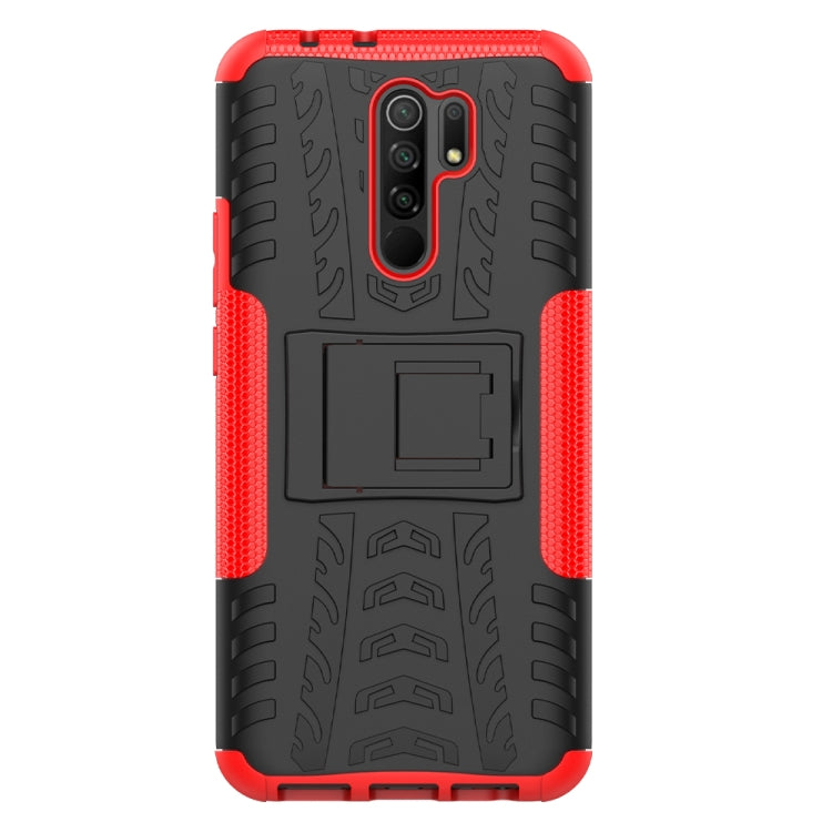 For Xiaomi Redmi 9 Tire Texture Shockproof TPU + PC Protective Case with Holder