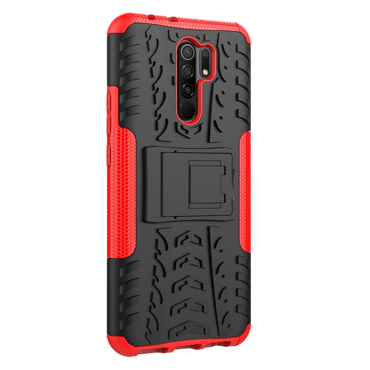For Xiaomi Redmi 9 Tire Texture Shockproof TPU + PC Protective Case with Holder