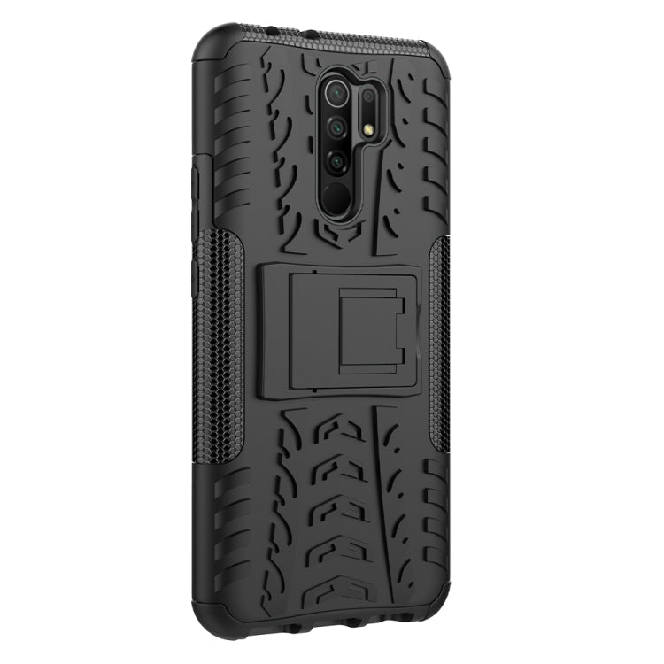 For Xiaomi Redmi 9 Tire Texture Shockproof TPU + PC Protective Case with Holder