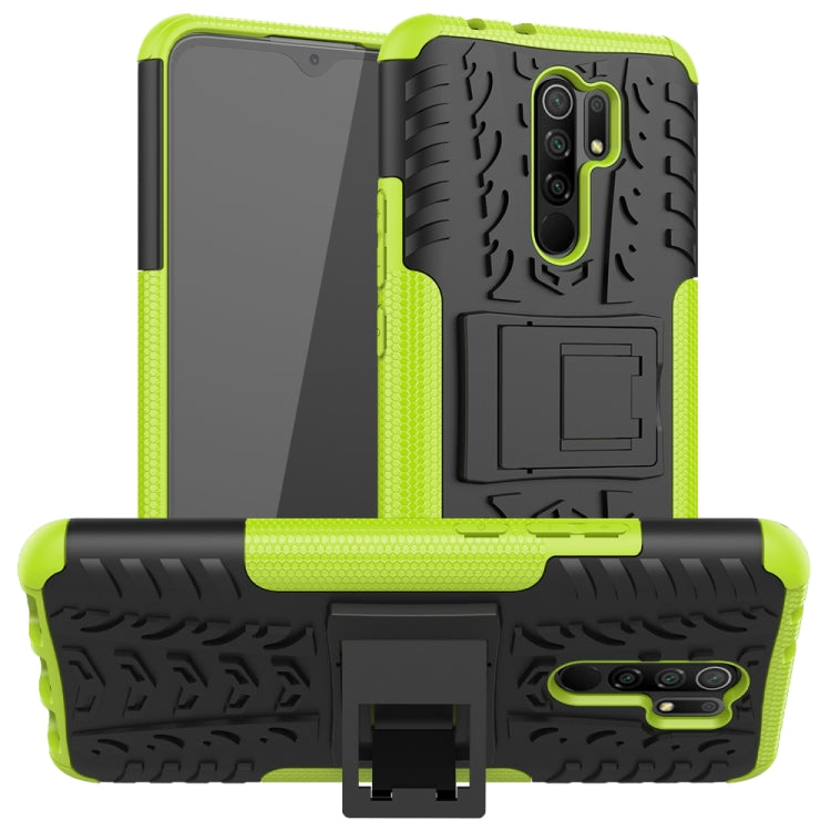 For Xiaomi Redmi 9 Tire Texture Shockproof TPU + PC Protective Case with Holder