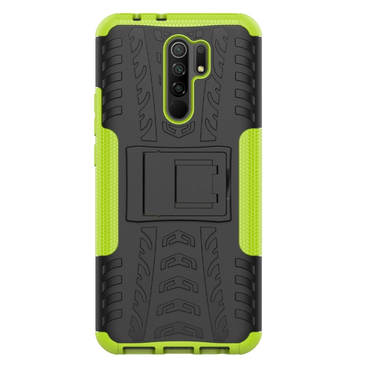 For Xiaomi Redmi 9 Tire Texture Shockproof TPU + PC Protective Case with Holder