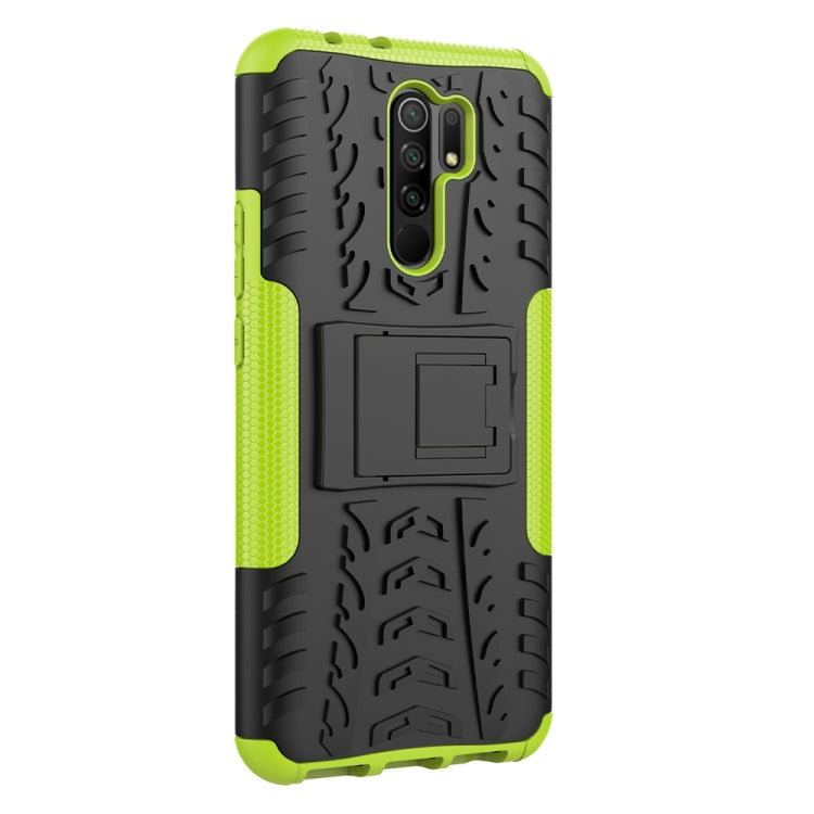 For Xiaomi Redmi 9 Tire Texture Shockproof TPU + PC Protective Case with Holder