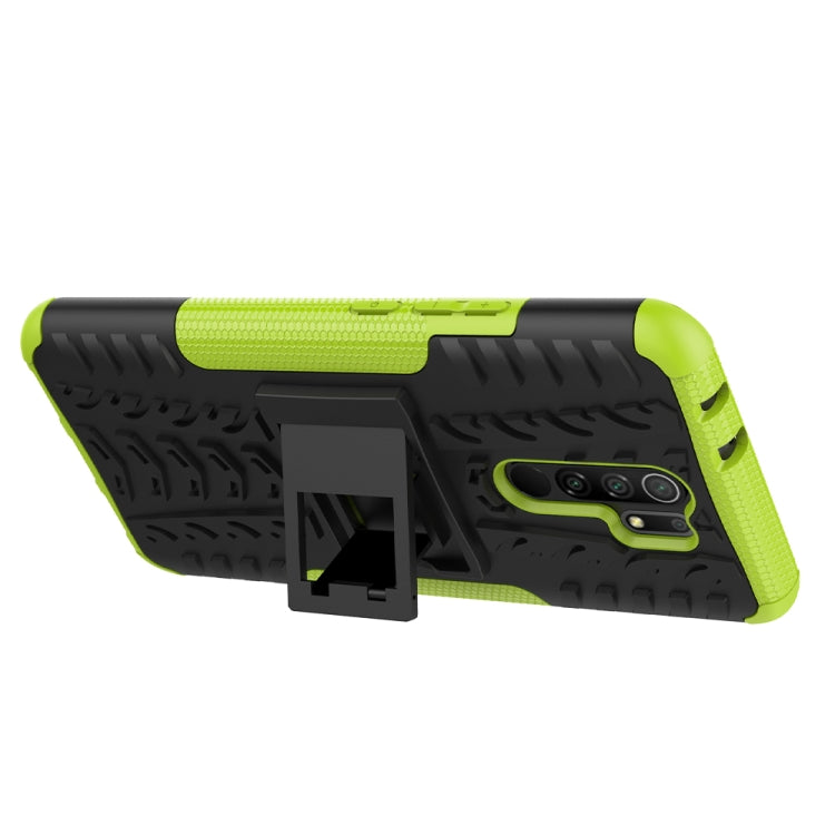 For Xiaomi Redmi 9 Tire Texture Shockproof TPU + PC Protective Case with Holder