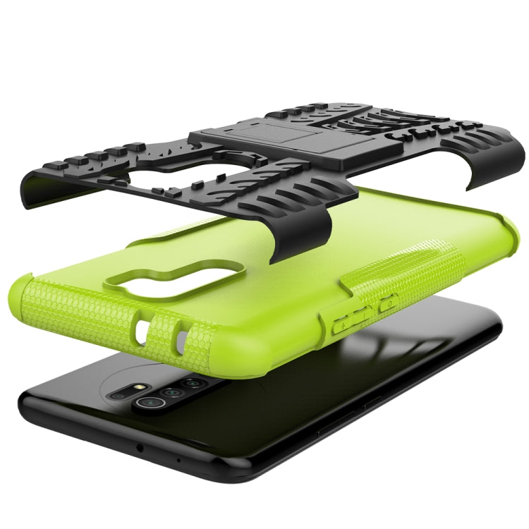 For Xiaomi Redmi 9 Tire Texture Shockproof TPU + PC Protective Case with Holder