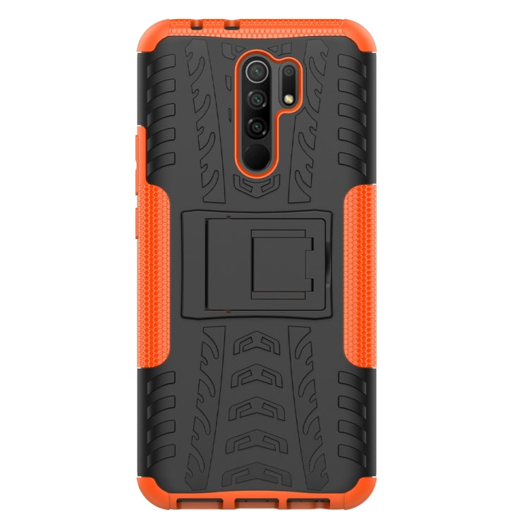 For Xiaomi Redmi 9 Tire Texture Shockproof TPU + PC Protective Case with Holder