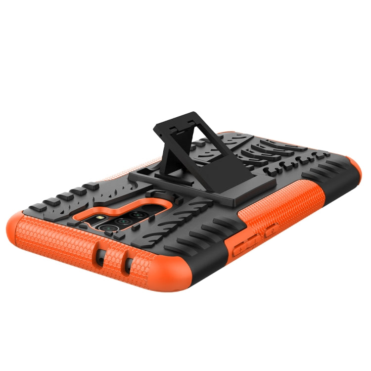 For Xiaomi Redmi 9 Tire Texture Shockproof TPU + PC Protective Case with Holder