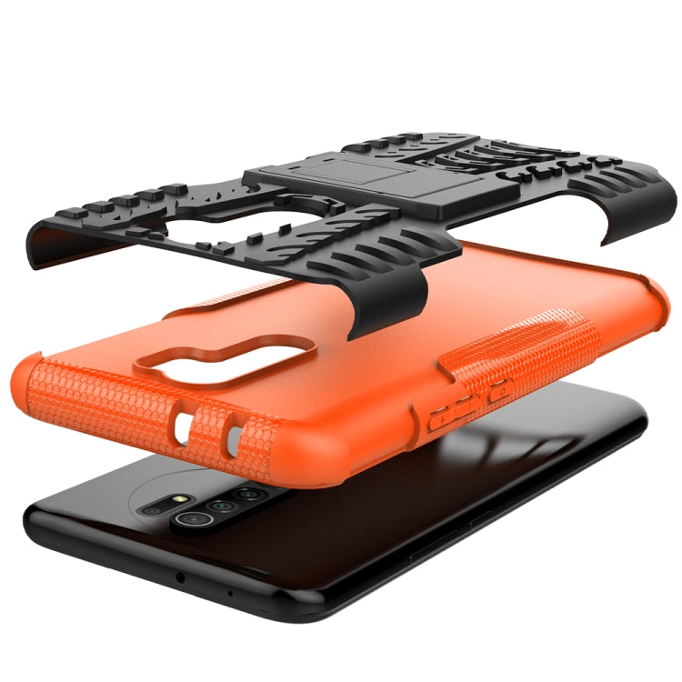 For Xiaomi Redmi 9 Tire Texture Shockproof TPU + PC Protective Case with Holder