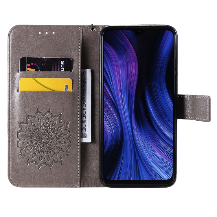 For Xiaomi Redmi 9 Sun Embossing Pattern Horizontal Flip Leather Case with Card Slot & Holder & Wallet & Lanyard