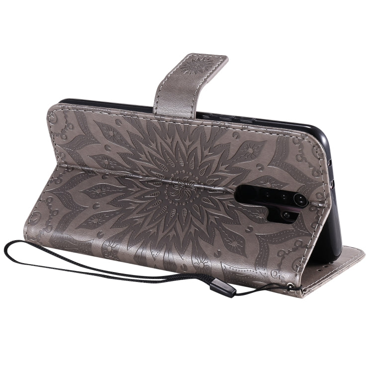 For Xiaomi Redmi 9 Sun Embossing Pattern Horizontal Flip Leather Case with Card Slot & Holder & Wallet & Lanyard