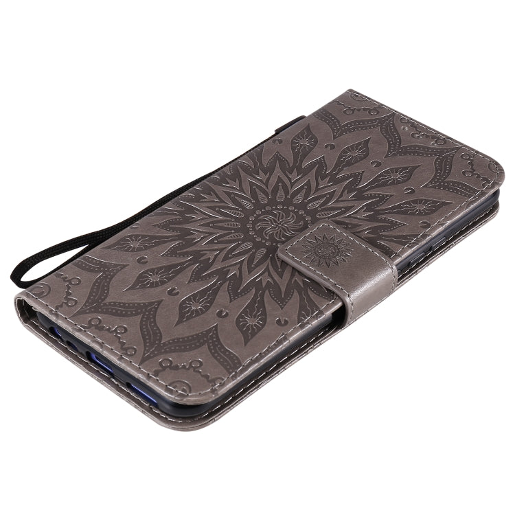 For Xiaomi Redmi 9 Sun Embossing Pattern Horizontal Flip Leather Case with Card Slot & Holder & Wallet & Lanyard