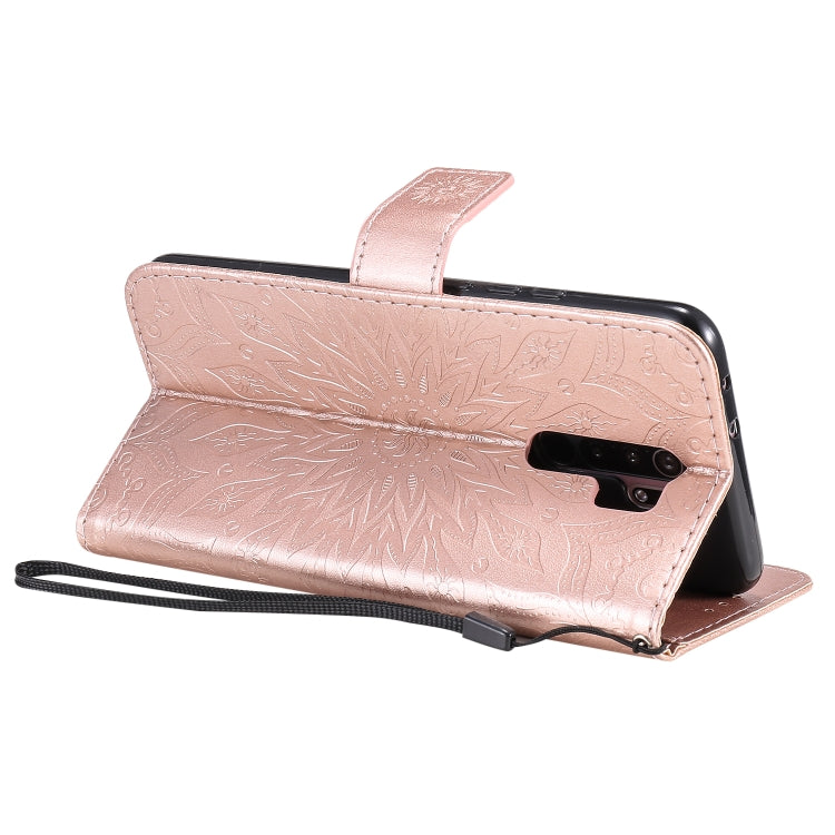 For Xiaomi Redmi 9 Sun Embossing Pattern Horizontal Flip Leather Case with Card Slot & Holder & Wallet & Lanyard