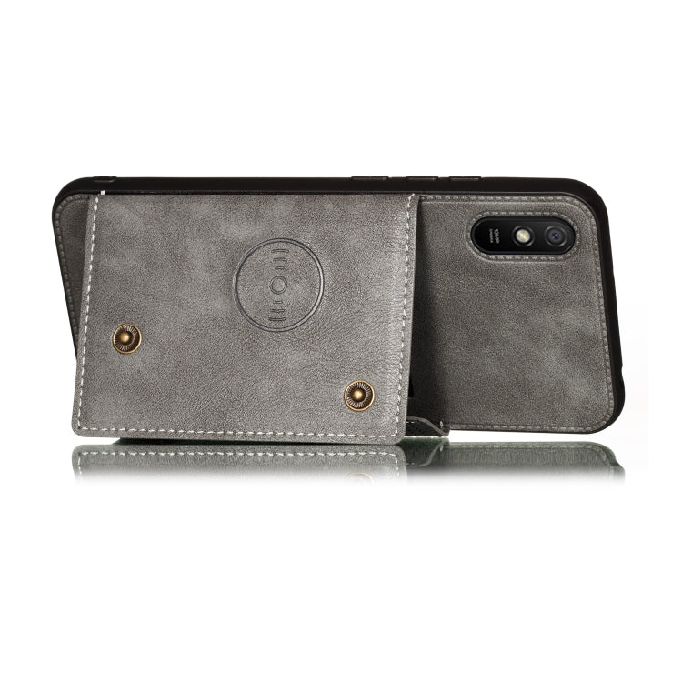 For Xiaomi Redmi 9A Double Buckle PU + TPU Shockproof Magnetic Protective Case with Card Slot & Holder