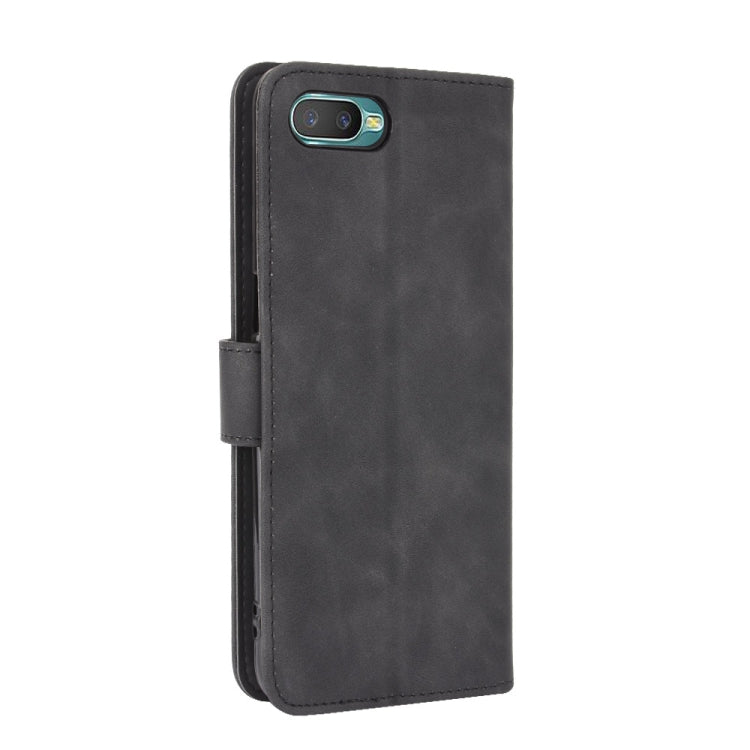 For OPPO Reno A Solid Color Skin Feel Magnetic Buckle Horizontal Flip Calf Texture PU Leather Case with Holder & Card Slots & Wallet