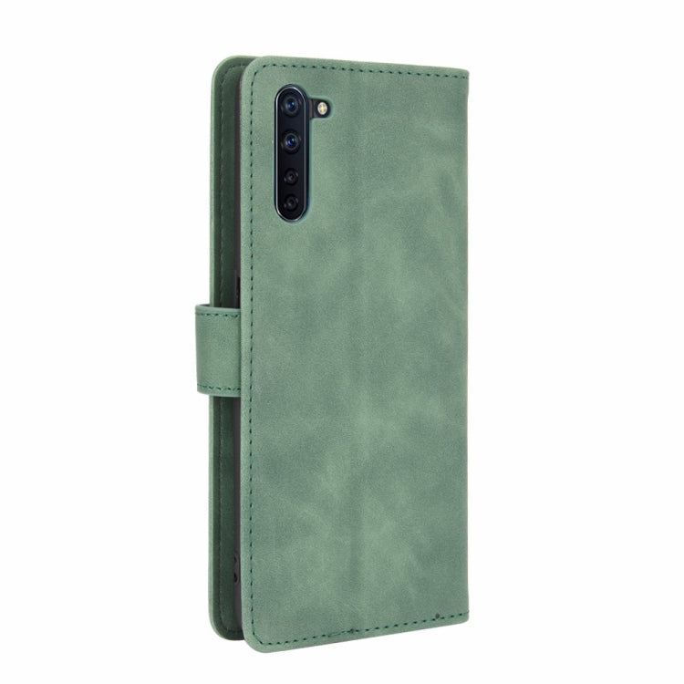 For OPPO Reno3 A(Japanese Version) Solid Color Skin Feel Magnetic Buckle Horizontal Flip Calf Texture PU Leather Case with Holder & Card Slots & Wallet
