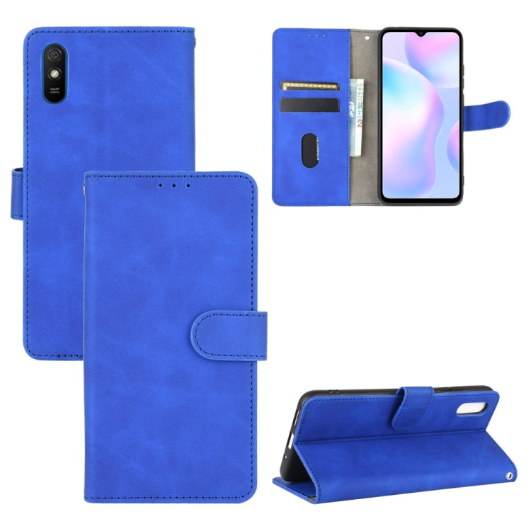 For Xiaomi Redmi 9A Solid Color Skin Feel Magnetic Buckle Horizontal Flip Calf Texture PU Leather Case with Holder & Card Slots & Wallet