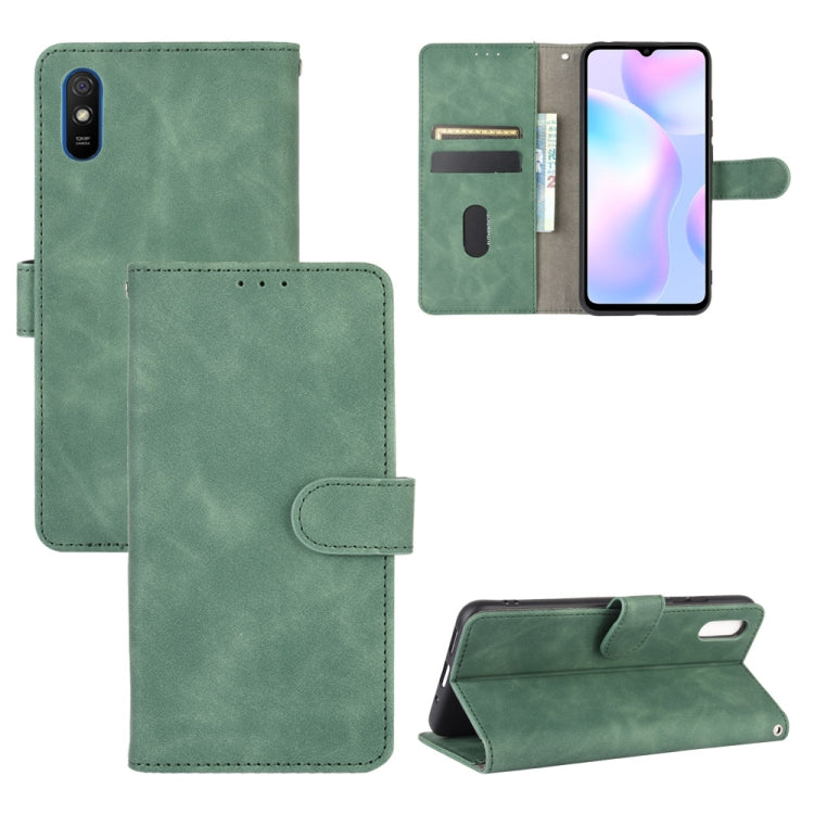 For Xiaomi Redmi 9A Solid Color Skin Feel Magnetic Buckle Horizontal Flip Calf Texture PU Leather Case with Holder & Card Slots & Wallet