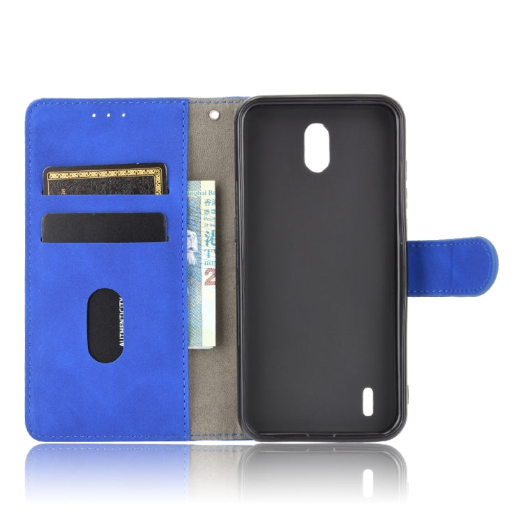 For Nokia 1.3 Solid Color Skin Feel Magnetic Buckle Horizontal Flip Calf Texture PU Leather Case with Holder & Card Slots & Wallet