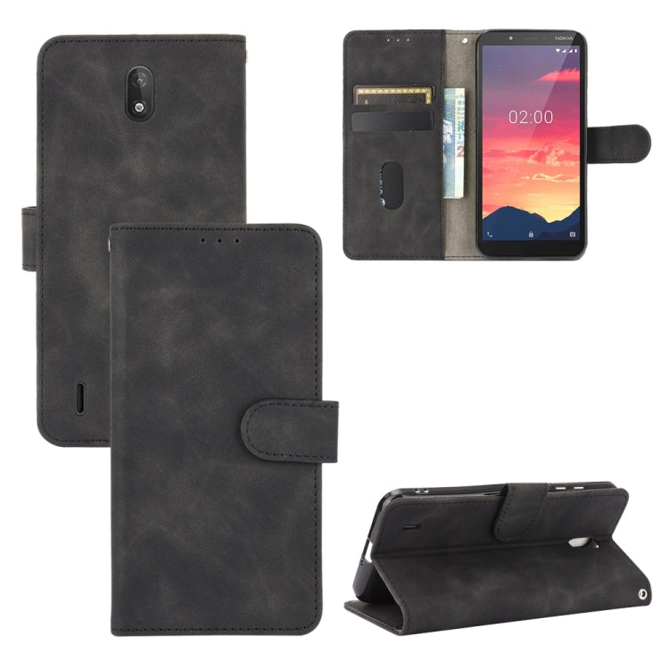For Nokia C2 Solid Color Skin Feel Magnetic Buckle Horizontal Flip Calf Texture PU Leather Case with Holder & Card Slots & Wallet