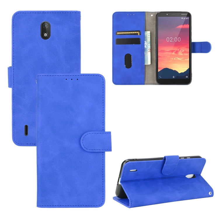 For Nokia C2 Solid Color Skin Feel Magnetic Buckle Horizontal Flip Calf Texture PU Leather Case with Holder & Card Slots & Wallet