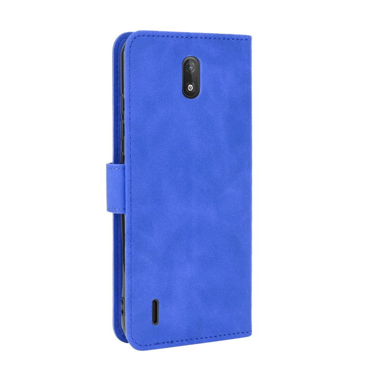 For Nokia C2 Solid Color Skin Feel Magnetic Buckle Horizontal Flip Calf Texture PU Leather Case with Holder & Card Slots & Wallet