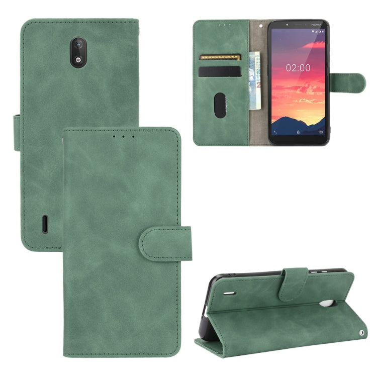 For Nokia C2 Solid Color Skin Feel Magnetic Buckle Horizontal Flip Calf Texture PU Leather Case with Holder & Card Slots & Wallet