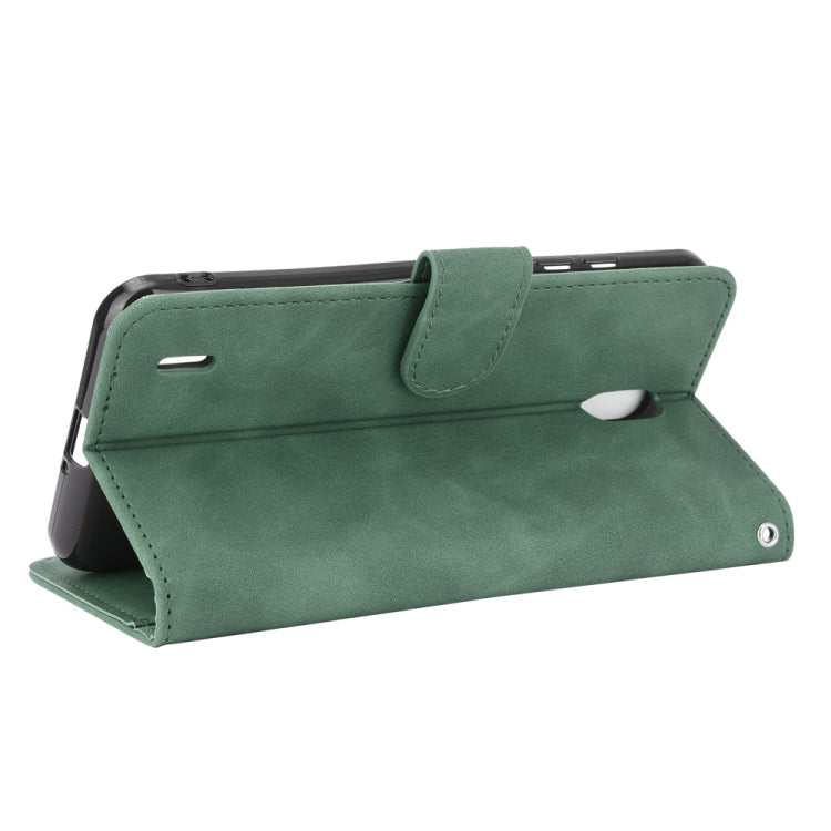 For Nokia C2 Solid Color Skin Feel Magnetic Buckle Horizontal Flip Calf Texture PU Leather Case with Holder & Card Slots & Wallet