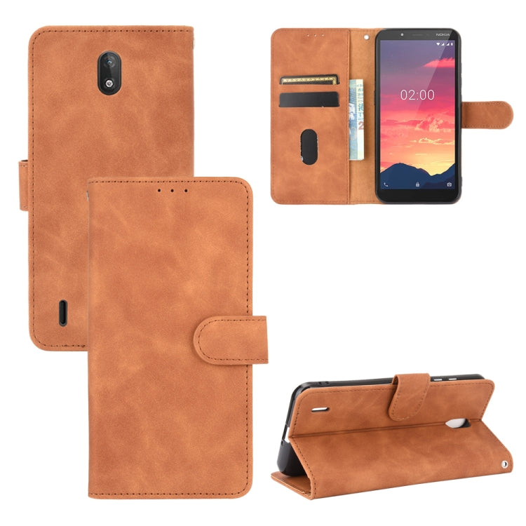 For Nokia C2 Solid Color Skin Feel Magnetic Buckle Horizontal Flip Calf Texture PU Leather Case with Holder & Card Slots & Wallet