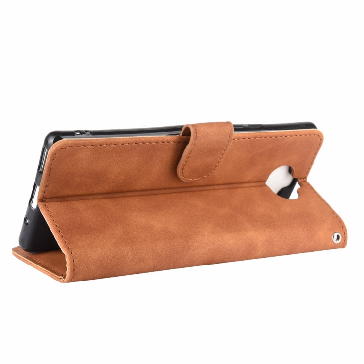 For Sony Xperia 8 Solid Color Skin Feel Magnetic Buckle Horizontal Flip Calf Texture PU Leather Case with Holder & Card Slots & Wallet